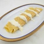 Schaal met crespelle en bechamelsaus