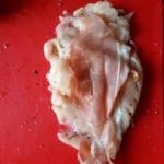 Leg een plak Parma ham op de kipfilet