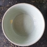 met boter ingevette ramekin