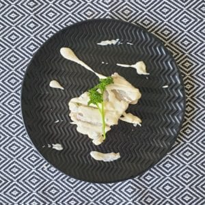 Koolvisfilet in peterselie saus
