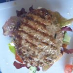 Leg de burger op je broodje