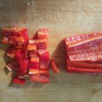 Snijplank met rode paprika