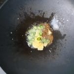 Wok met chili peper, gember en komijnzaadjes